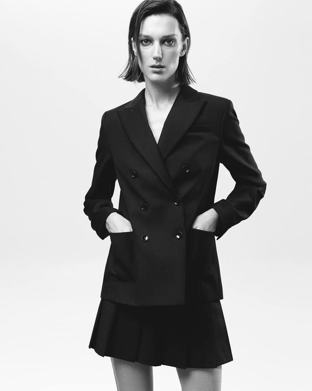 Black woolen pleated mini skirt