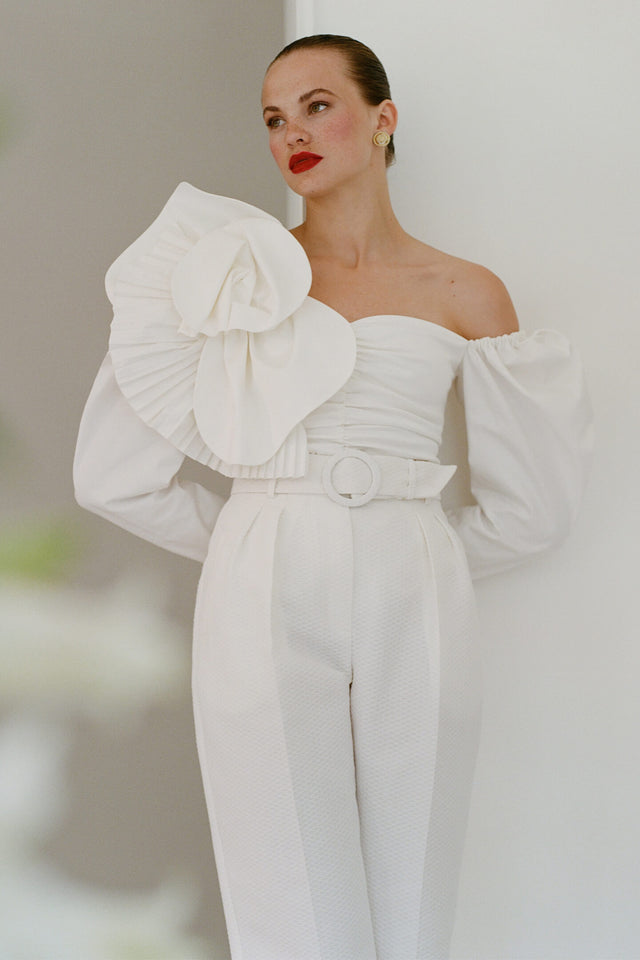Model in milky-white 3d cotton off-shoulder top front view