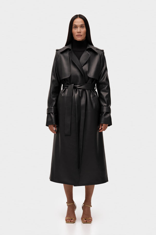 Model in black Trench