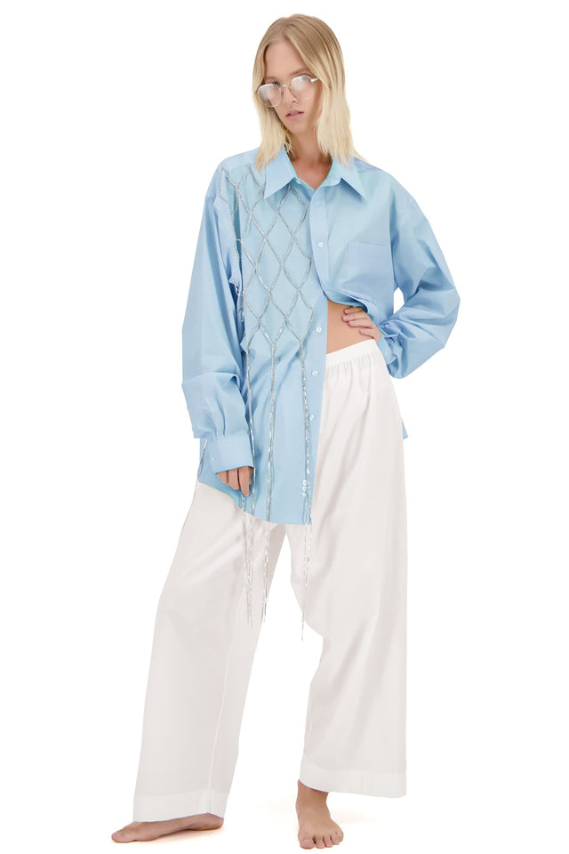 Model in blue Redesigned shirt with crystals