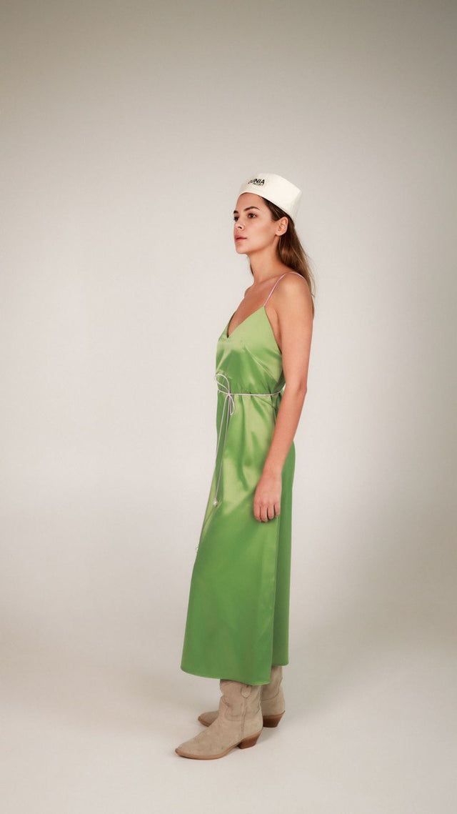 Dress with an open back and a decorative belt