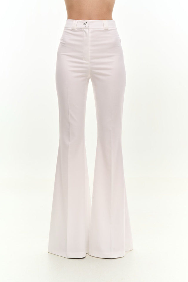 FLARE PANTS WITH CRYSTAL FASTENING.