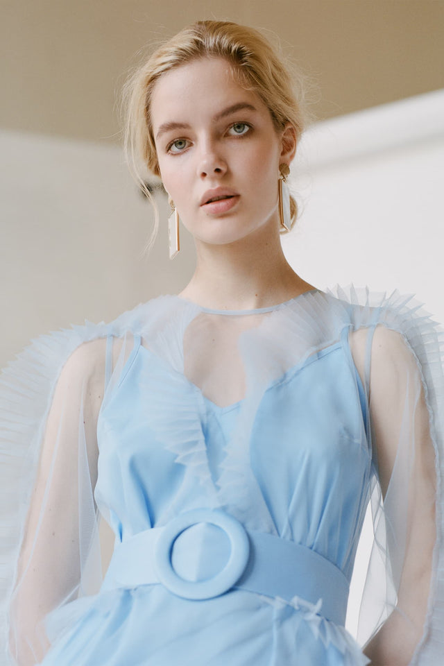 Model in Iconic ruffle long tulle dress baby blue