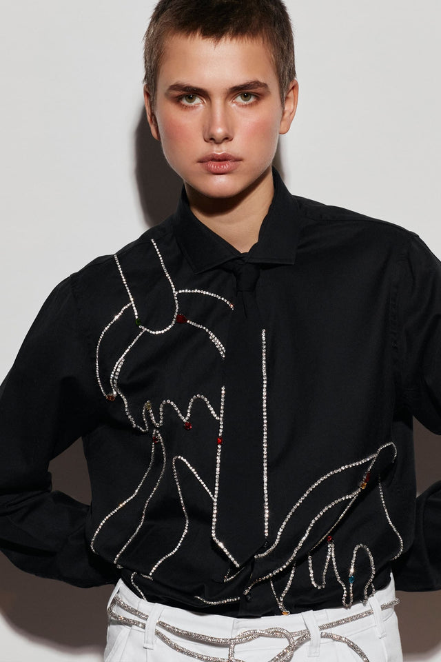Model in black Shirt Omelia with hand-embroidered flower