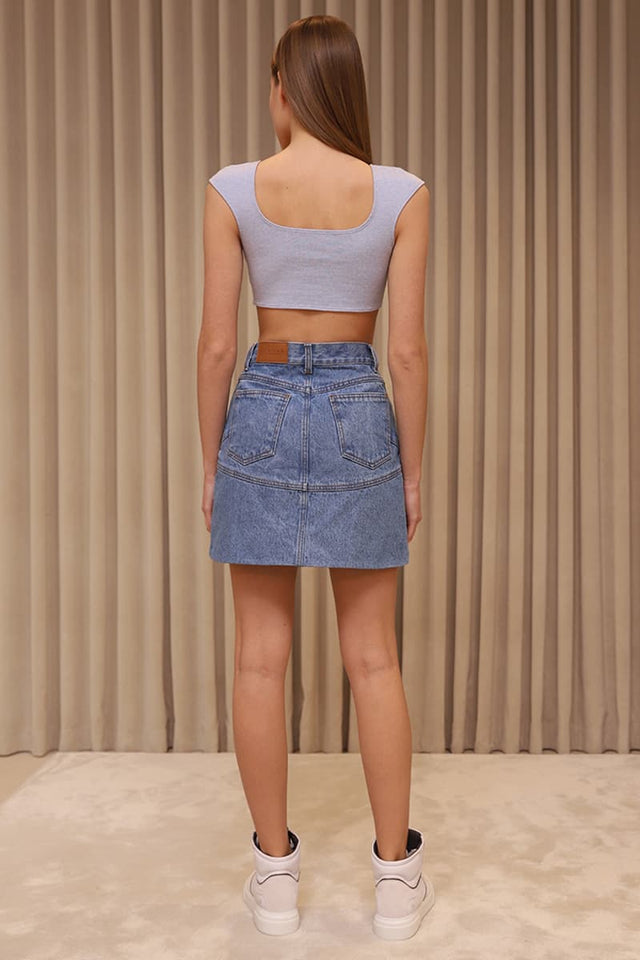 Model in Corset mini skirt back view
