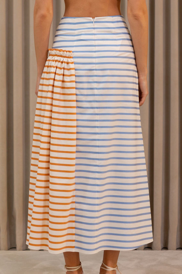 Model in Striped gathered skirt back view